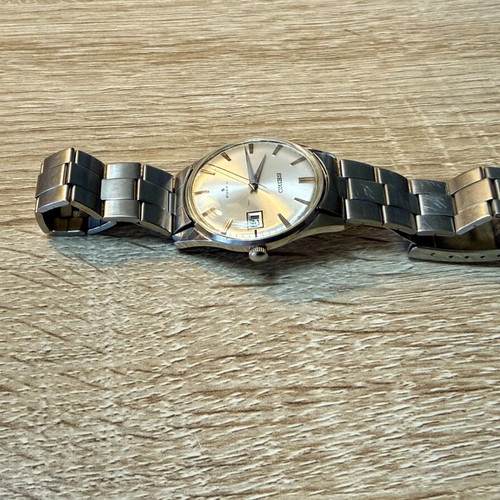 Seiko Vintage wristwatch used with original bracelet, white dial