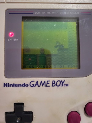 Game Boy (1989) like new, collectible console with 4 cartridges