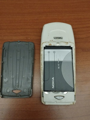 Nokia 6100 used, unknown condition, gray