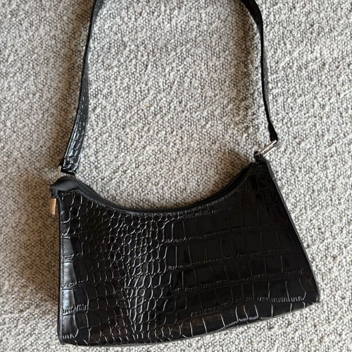 Shoulder bag like new, black with embossed patterns