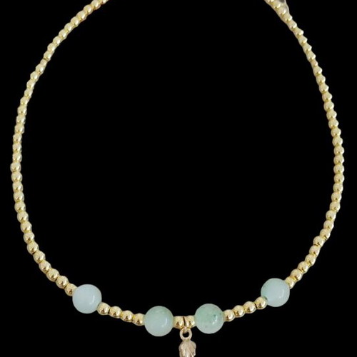 Necklace with gold beads and heart pendant with gold leaves new