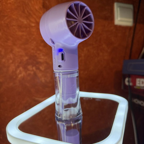 Mini USB Water Mist Fan like new, portable and rechargeable