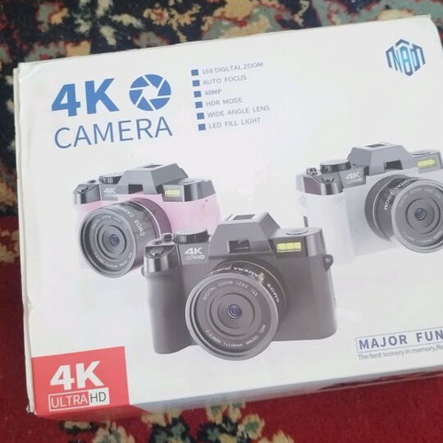 MBD 4K camera new with lens and memory card
