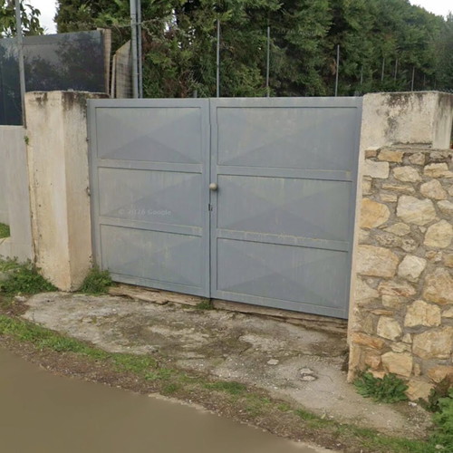 Iron double swing garden gate, like new, convertible to sliding