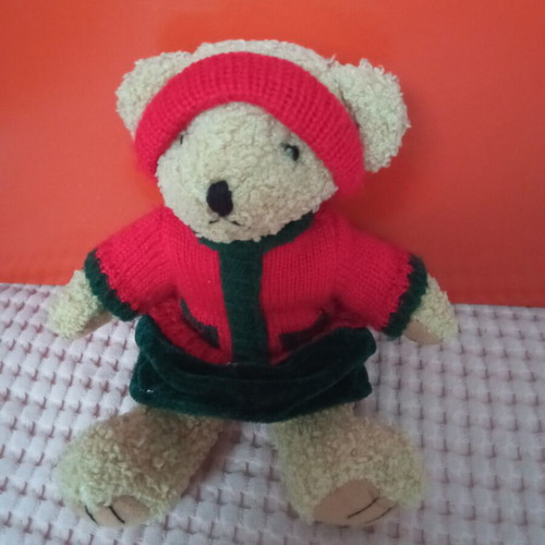 Teddy bear like new, height 23 cm
