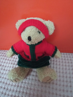 Teddy bear like new, height 23 cm
