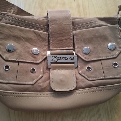 Women's shoulder bag used, beige with metal details
