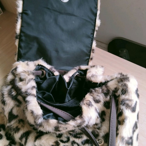 Leopard print backpack like new, beige and brown