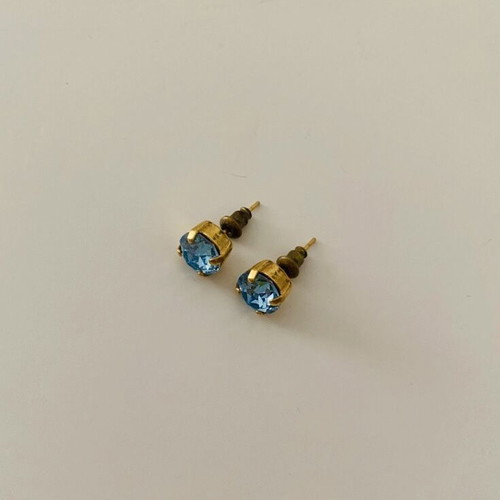 Earrings used, yellow color with blue stone