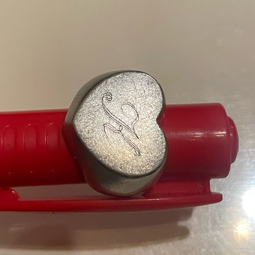 Silver heart ring used, size 7 with K hallmark