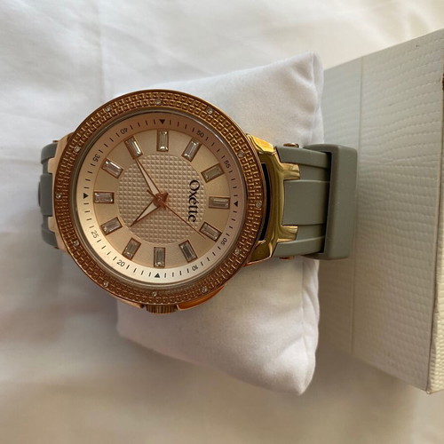 Oxette women's watch new in green and gold with crystals