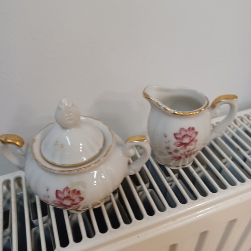 Sugar bowl and creamer used set