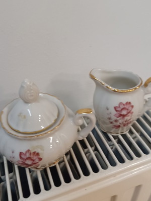 Sugar bowl and creamer used set