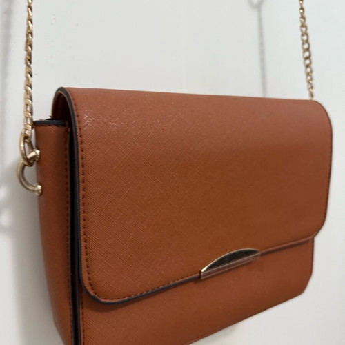 Small tan crossbody bag lightly used