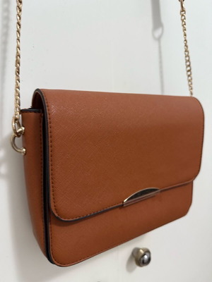 Small tan crossbody bag lightly used
