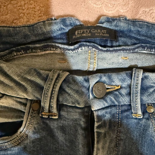 Fifty Carat jeans like new with knee rips, size 28