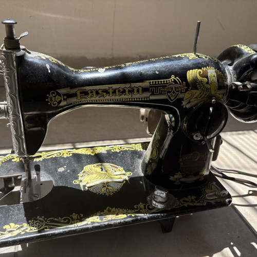 Vintage Eastern sewing machine used with gold Egyptian designs