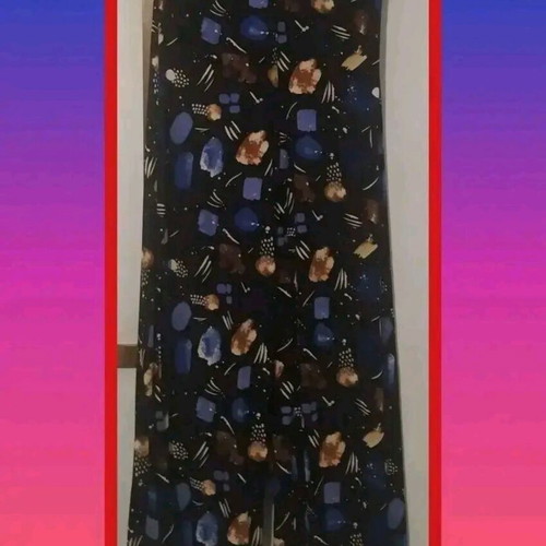 Pants in shades of blue with beautiful pattern, like new