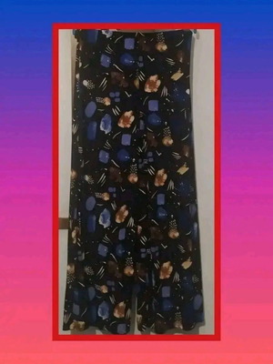 Pants in shades of blue with beautiful pattern, like new
