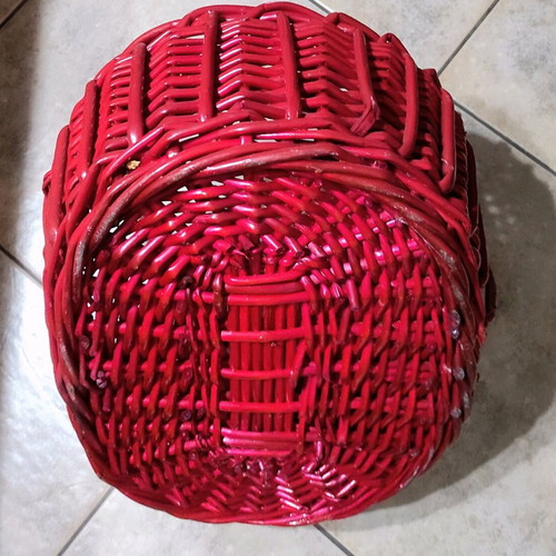 Two woven baskets in red and brown