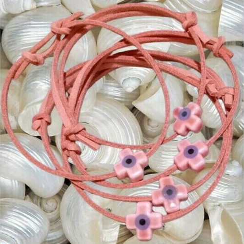 Set of 100 handmade baptism witness bracelets with suede cord and pink ceramic cross