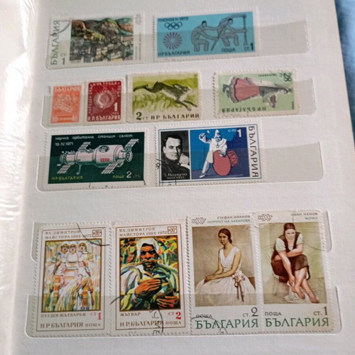 Two stamp albums with stamps from around the world
