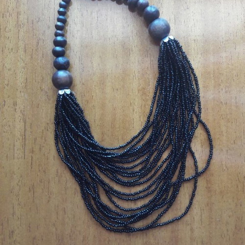 Black necklace made of wood and plastic