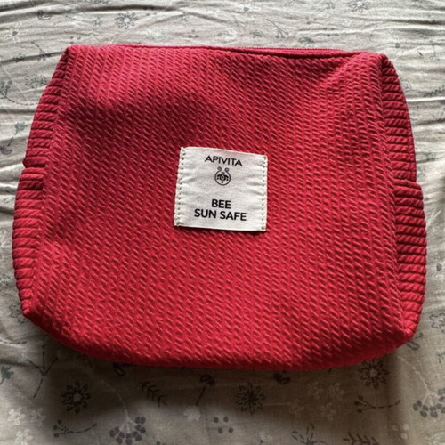 Apivita Bee Sun Safe toiletry bag, red