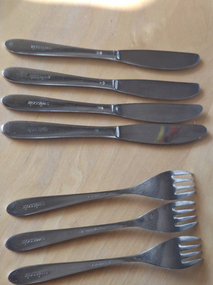 Swissair collectible cutlery set, 3 forks and 4 knives