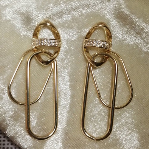 Unique earrings new in gold color