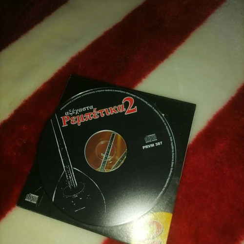CD Axechasta Rempetika 2 like new, laiko