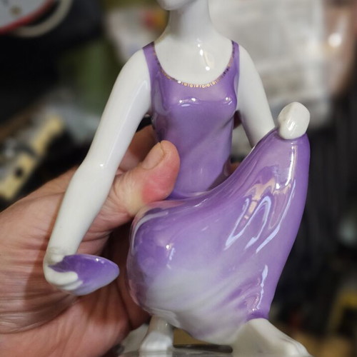 Hollohaza porcelain figurine of girl collecting water used