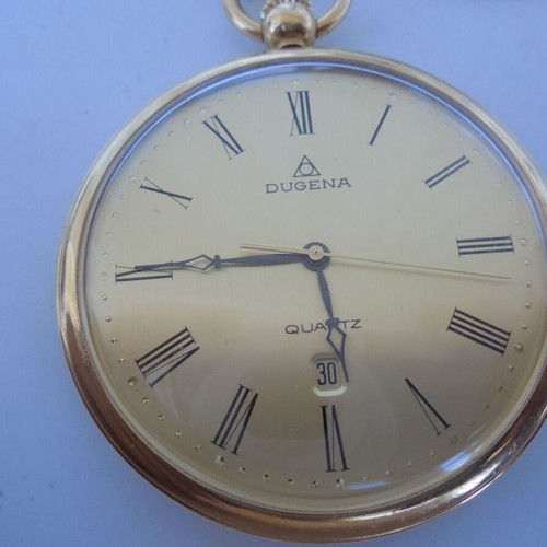 Dugena pocket watch quartz like new, gold color with chain