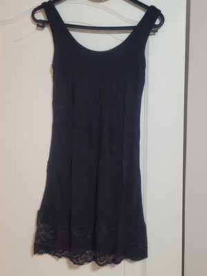 Black long tank top with lace trim, size medium