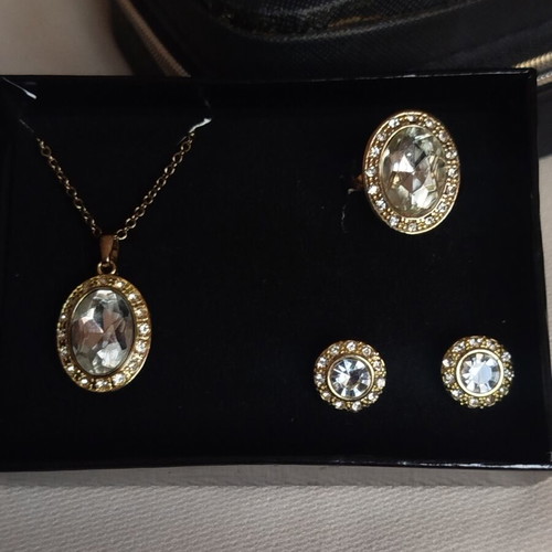 Avon jewelry set with gold color, rhinestones and stones, steel
