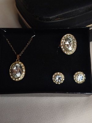 Avon jewelry set with gold color, rhinestones and stones, steel