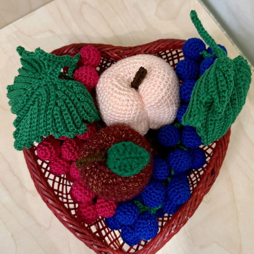 Basket with handmade fruit decoration