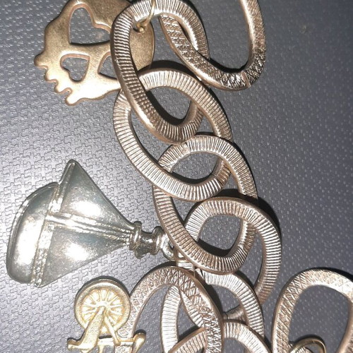 Bracelet new with boat, skull, and bicycle charms