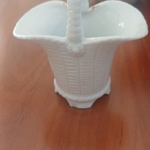 Porcelain decorative item used with a broken handle