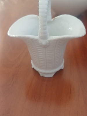 Porcelain decorative item used with a broken handle