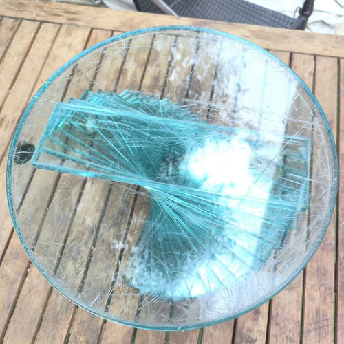 Round coffee table used with glass spiral base