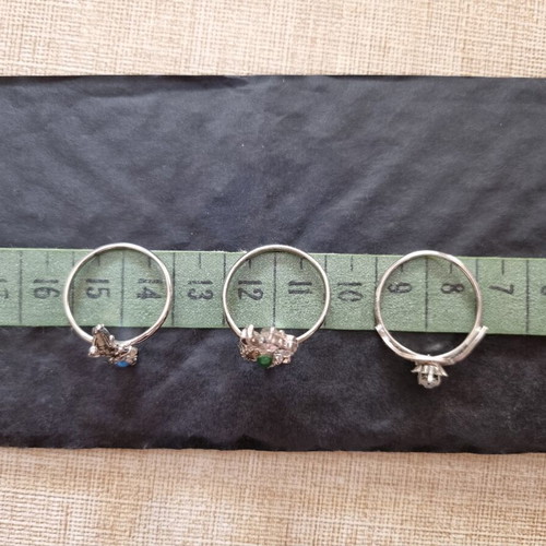 Set of 3 rings with blue, green and white stones