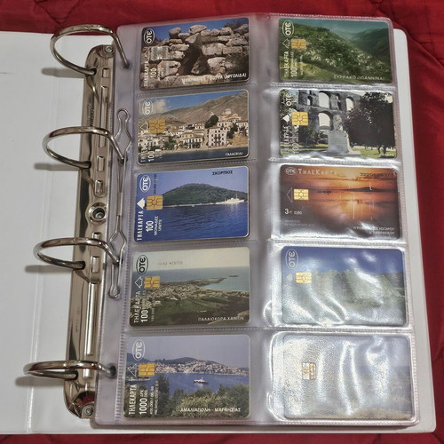 Phone cards used, album with 560 pieces