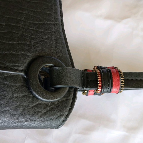 Women's shoulder bag used, black with red details