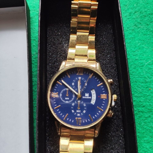 Men's Watch gold color with blue dial and metal bracelet like new