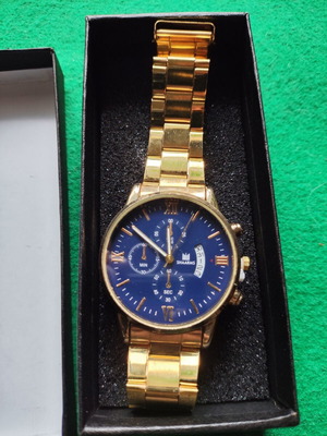Men's Watch gold color with blue dial and metal bracelet like new