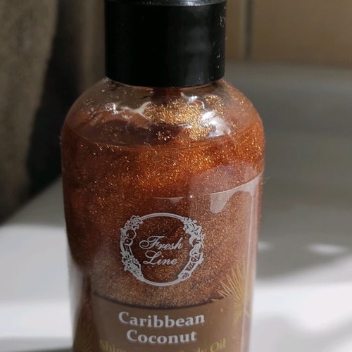 After sun oil Caribbean coconut Fresh Line used with glitter