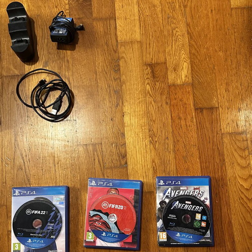PlayStation 4 Pro 1TB like new with 3 controllers and 7 games