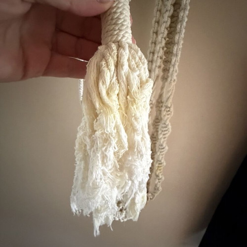 Macrame plant hanger used with wooden beads for pots