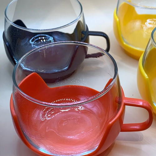 Glass cups with plastic holders vintage '70s set of 4 like new
